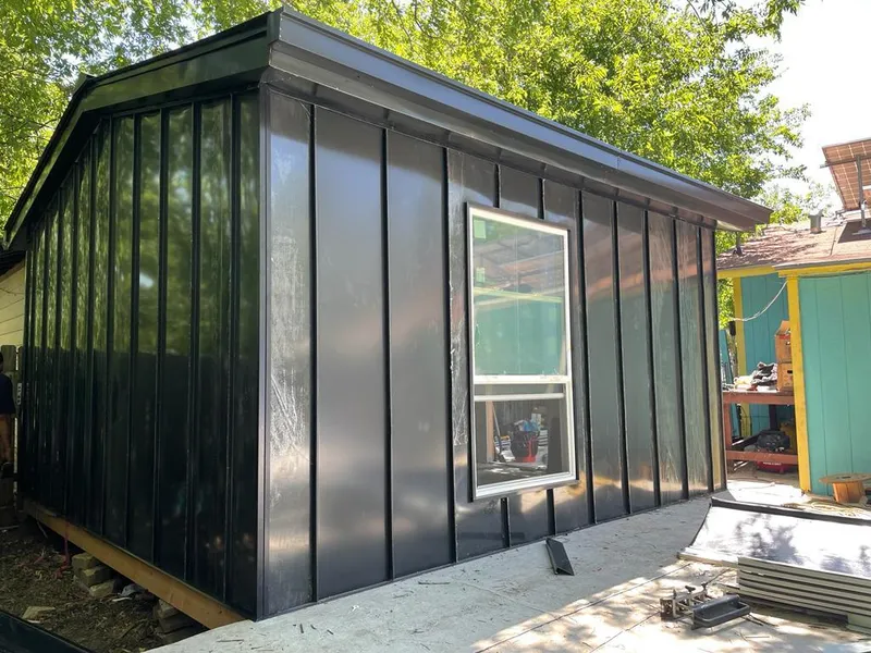 Black standing seam metal wall panels for Metal Roof Installation in Alamo