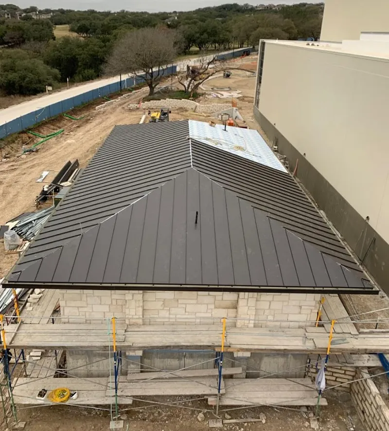 Metal roof new construction with scaffolding in Alamo